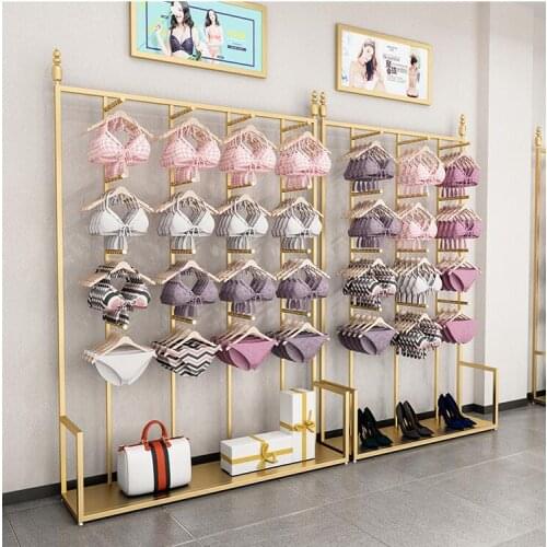 The store is hanging the side-hanging bra display rack, the shopping mall is hanging the shelf for the underwear