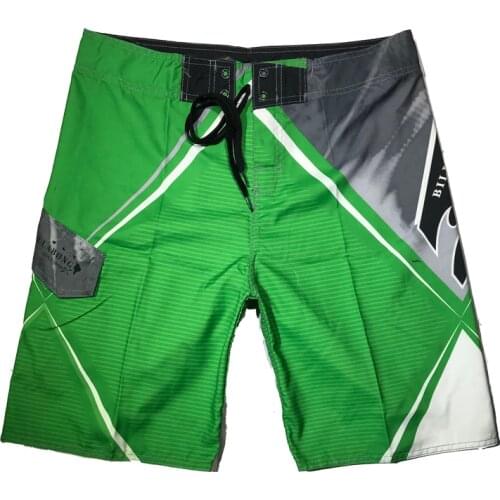 New summer mens shorts casual loose pants big shorts printed large size five mens speed dry surf beach pants