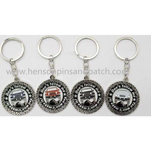 Custom metal soft enamel round glow in dark car key chains , car keyring