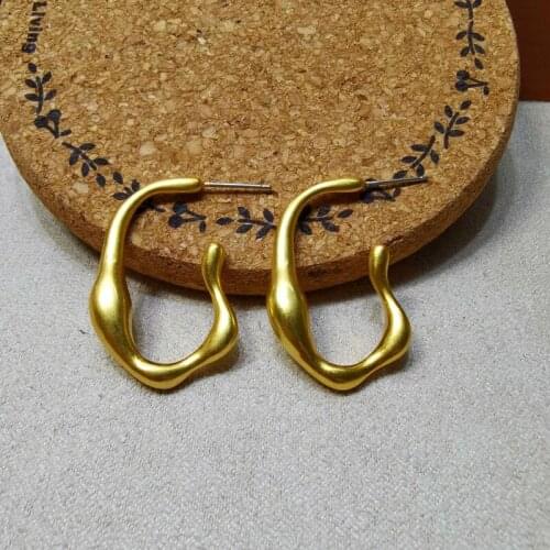 European and American retro cold wind irregular metallic texture earrings simple temperament earrings mesh red earrings women