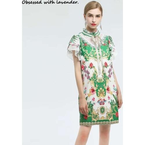 Obsessed with lavender. New European and American goddess red and green lace stitching lotus leaf sleeve hollow dress summer