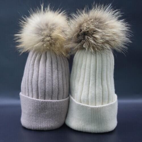 New arrival raccoon fur woolen striped knitted pom pom beanies sharp knitted warm genuine raccoon fur pom pom hat multi colors