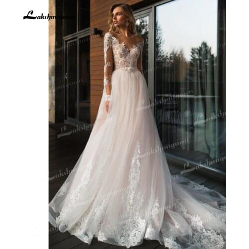 Stunning A-line Tulle Wedding Dresses With Beading Lace Appliques Illusion Long Sleeve V-Neck Floor-Length Beach Bride Gown 2021