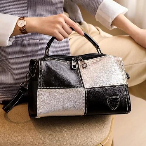 Black with silver messenger travel bag