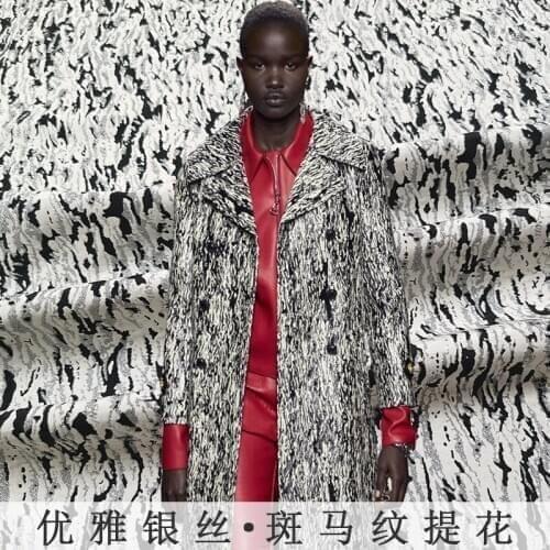 Silver embossed zebra pattern yarn-dyed jacquard windbreaker fabric autumn and winter fashion catwalk custom suit jacket fabric