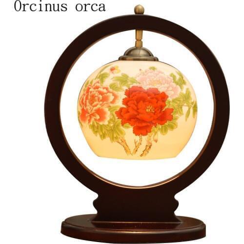 New Chinese antique creative ceramic table lamp bedroom bedside lamp American Pastoral flower painting solid wood desk lamp