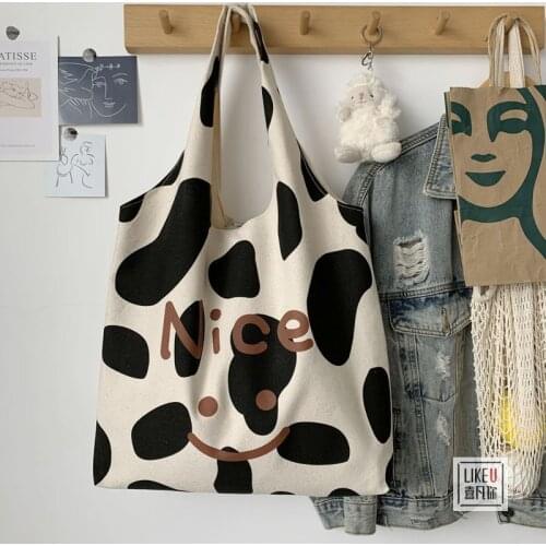 Elegant Cow Pattern Shoulder Bag Women Kawaii Large Capacity Canvas Tote Handbags Simple Chic Animal Shopping Bags Female WY131