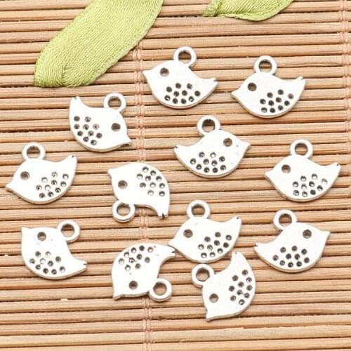 120pcs tibetan silver color cute little cartoon bird design charms H1787