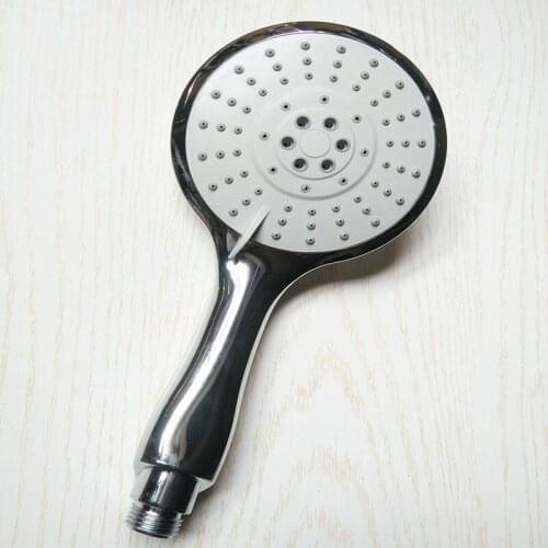 Bathroom shower head hand held shower head water saving multi-functional racket water saving shower nozzle