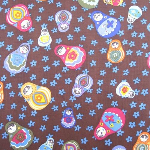 1 yard Polyester/PVC coated Waterproof Fabric for bag, dolls on Chololate background (width=140cm)