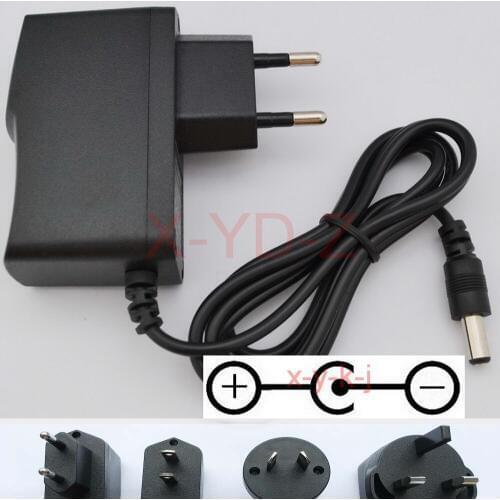 1PCS High quality AC/DC 9V 1A Switching Power Supply adapter Reverse Polarity Negative Inside EU US AU UK 5.5mm x 2.1mm-2.5mm