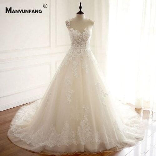Robe De Mariée 2021 Hot Sale Illusion O-Neck Lace Appliques Tulle Chapel Train Bridal Ball Gown Elegant Sleeveless Wedding Dress