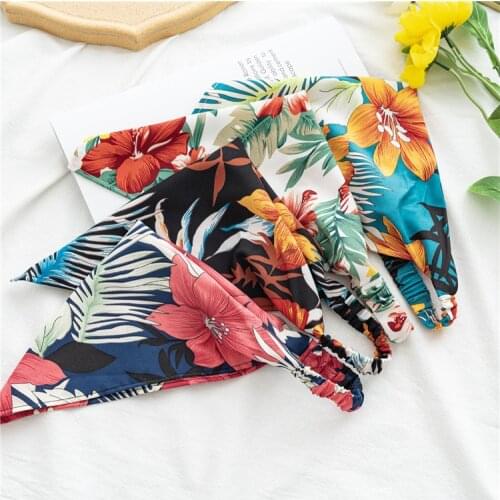 The new European and beautiful girl-style pastoral floral Baotou triangle scarf hot sale stretch square scarf headdress
