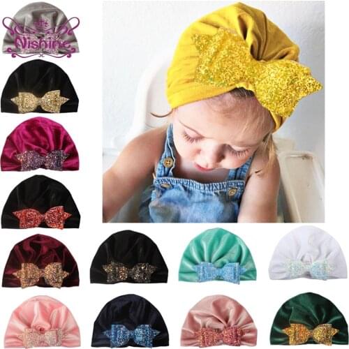 Nishine 1 PCS Colorful Sequins Bowknot Toddler Hat Comfortable Warm Cotton Infant Caps Fashion Bows Headwear Clothing Decoration