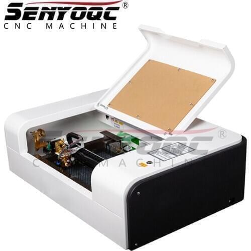 Popular mini graver pet sale portable 3d photo crystal co2 laser marker and cnc name tag engraving machine for wood acrylic wine