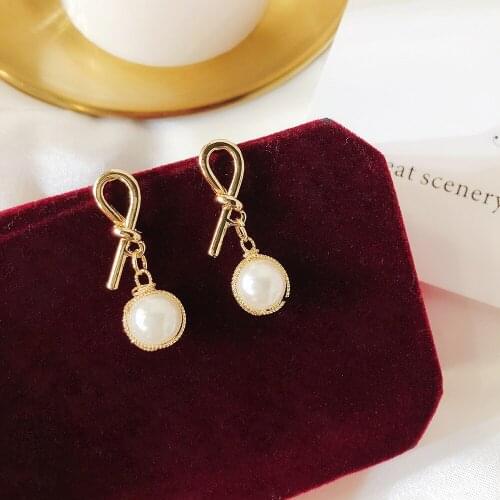 2019 new brand design hollow metal winding imitation pearl tassel earrings generous creative bohemian earrings for women