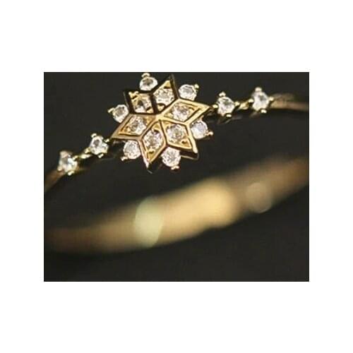 Gu Li Trendy Golden Color Snowflake Inlaid Crystal Ring For Women Simple Creative Engagement Party Ring Jewelry Whole Sale