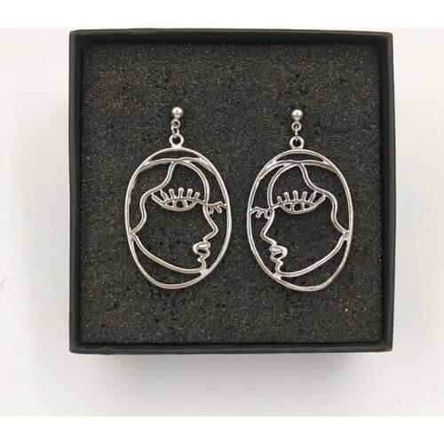 New metal face Earring For Women Three-dimensional lines hollowed out personality Facial makeup Earrings