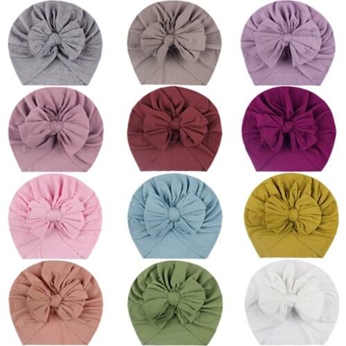 18*17 CM Newborn Infant Warm Nylon Hats Handmade Bowknot Elastic Caps Children Bows Headwear Baby Holiday Decoration 12 Colors