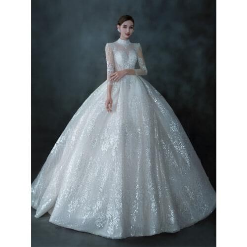 Luxury White Wedding Dresses Long Sleeves Saudi Arabia Sequined Crystal Beaded Sexy Illusion High Neck Princess Bridal Gowns New