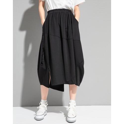 Designers hip covered slim fashion skirt 2021 summer personalized stitching split cut flower bud skirt