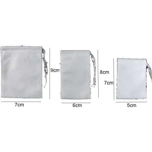 9*7CM 100Pcs/Lot Tea Bags Empty Scented Drawstring Pouch Bag 5*7CM /6*8CMSeal Filter Cook Herb Spice Loose Coffee Pouches Tools