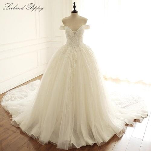 Luxury A-line Tulle Wedding Dress 2020 Boat Neck Off the Shoulder Floor Length Crystal Beaded Vestido de Novia Bridal Gowns