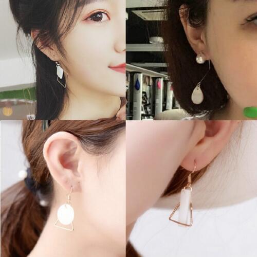 Europe And The United States Simple Hollow Triangle Earrings Fashion Alloy Triangular Geometry Round Shells Fall Female Earrings