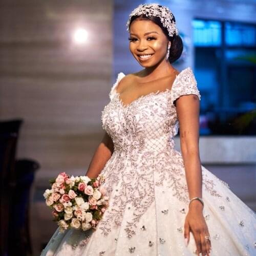 2021 Arabic Luxurious Wedding Dresses Beads Bridal Gowns Custom Made Short Sleeves Sweep Train Ball Gowns