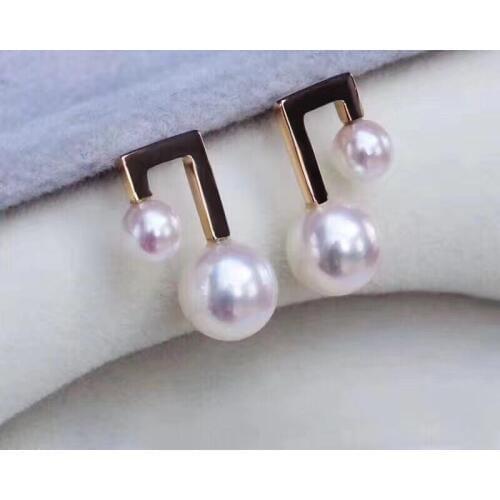 Charming pair of 6-10mm south sea round white pearl earring 18k