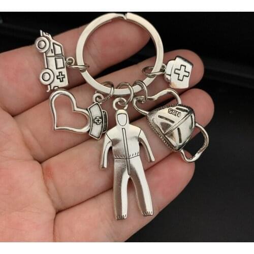 New Nurse Medical Box Medical Key Chain Mask Needle Syringe Stethoscope Cute Angel Spin Keychain Take Care of Yourself Key Ring