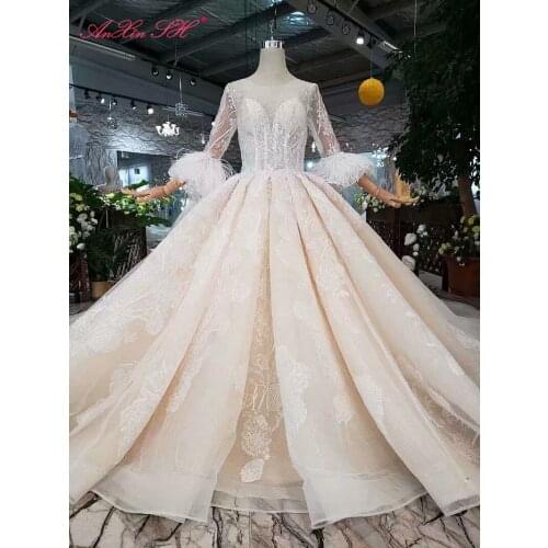 AnXin SH Luxury princess white flower lace beading crystal illusion o neck feather half sleeve wedding dress 100% real photo