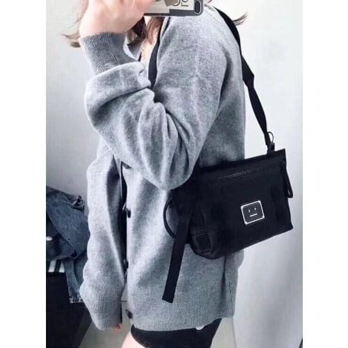 2021 new single shoulder bag metal name plate dumpling cross bag mens and womens single shoulder bag tide bag mobile phone bag