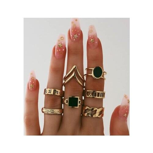 Trendy vintage V-shaped ring 7-piece set geometric personality hollow black oil dripping ladies ring set