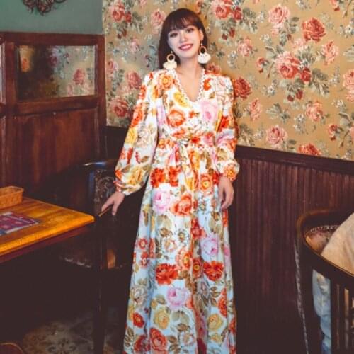 Summer new womens Korean version of ins retro printing lantern sleeve long dress lantern sleeve V-neck bohemian beach dress