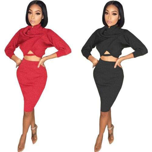 54L0337 Autumn and winter Europe and America autumn pure color long sleeve open navel pleated buttock skirt sexy fashion suit