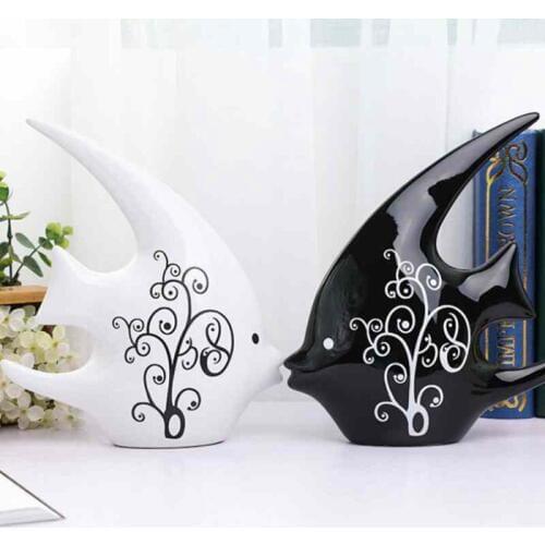 A black and white couple ceramic kissing fish modern home decoration of wedding gifts