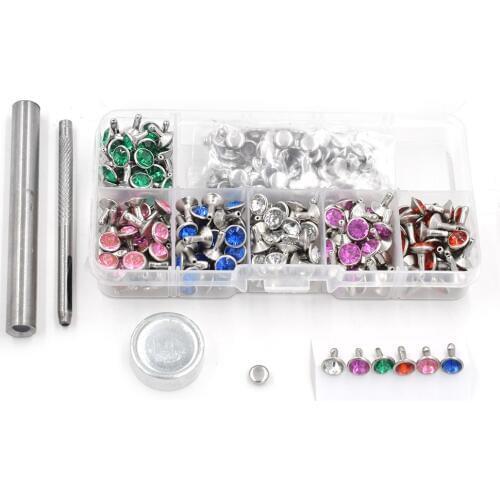 240PCS metal rivet + manual installation tool. Acrylic diamond buttons. Snaps. Colored decorative nails. Clothing & Accessories