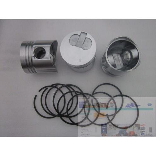 Set of pistons with piston rings (one engine used) for Laidong KM385TE ( swirl chamber engine with EPA)