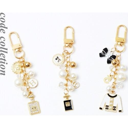 Jewelry Camellia Clothes Rhinestone Crystal Twinkling Perfume Bottle Pearl Bow Coi Keychain Keyring Gift For Girls Handbag Chram