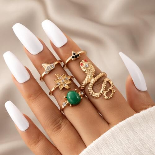 Docona Women Men 7 pcs/sets Luxurious Gold Color Finger Rings Sets Punk Eyes Snake Flowers Heart Shape Jewelry Accessories 7068