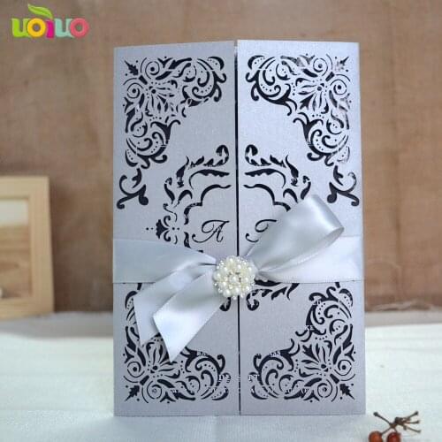 DIY 25set free customize inc115 laser cut wedding invitation card silver,tied bow ,brooch rhinestone,printing card,envelope seal
