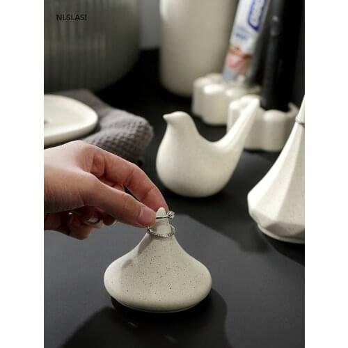 Ceramic ring storage holder, jewelry storage seat, bathroom countertop display stand, decorative craft ornaments, three rice