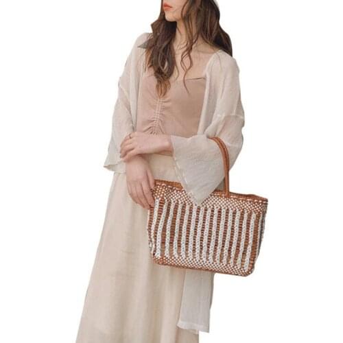 Elegant vegetable basket bag leather handbag hollow Japanese first layer cowhide hand-woven striped bag female vacation