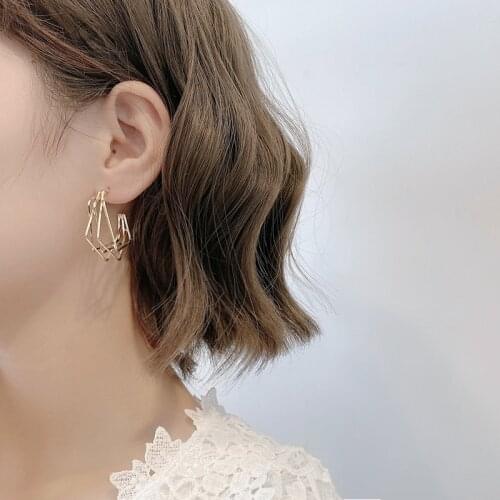 ZHANGU Stud Earrings