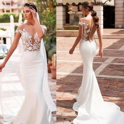 Elegant Simple Wedding Dress Cap Sleeve With Buttons Pearls Lace Flowers Applique Sexy Illusion V Neck Mermaid Bridal Gowns