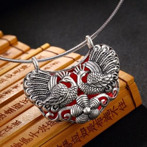 Restoring ancient ways is the peacock plum flower inlaid chalcedony pomegranate red pendant chain female long sweater