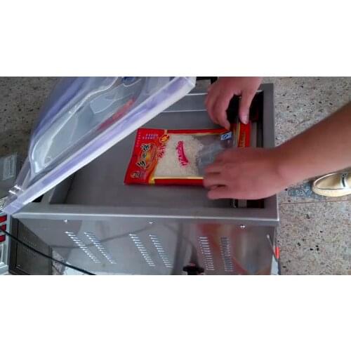 Hot sale table top Commercial aluminum foil single chamber clothes food vacuum sealer packaging machine with cheap price