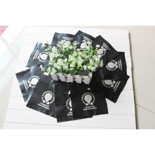 Customized plastic gift bag punch handle storage bag clothes or cosmetics white or black single color logo 500pcs min order