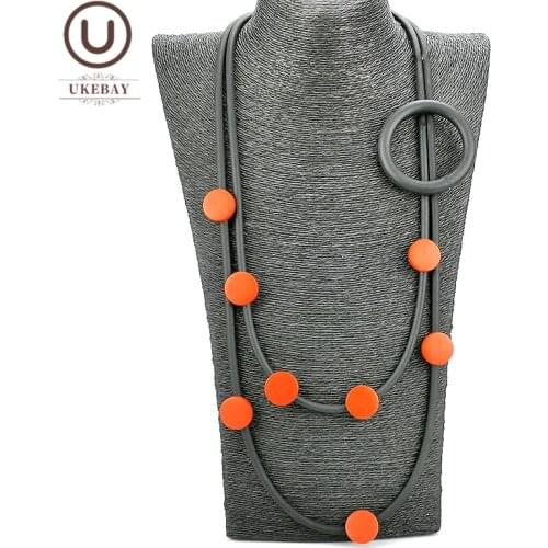 UKEBAY New Designer Pendant Necklace Clothes Accessories Women Strange Jewelry Gothic Sweater Necklace Red Wood Elasticity Chain